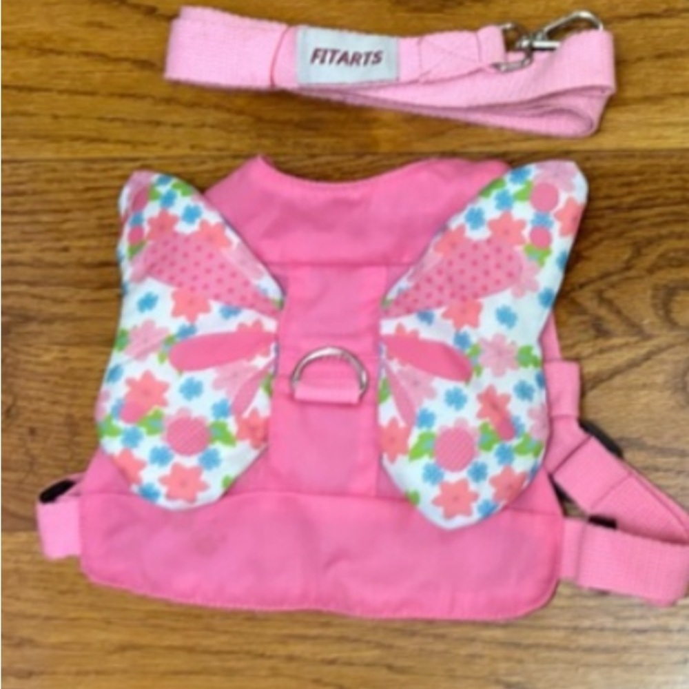 Pink butterfly wings for kid. Could double as costume and safety harness!
